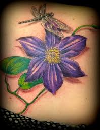 Beautiful dragonfly and flower tattoo. The Tattoo Lodge Marion Ohio