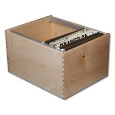 Place as many manila folders into the hanging folders as will comfortably fit. File Drawers