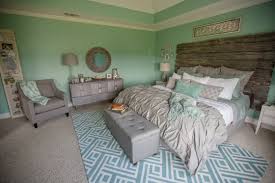 Gray And Aqua Bedroom With Rustic Barn Door Headboard Bedroom Makeover Home Bedroom Bedroom Inspirations