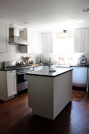 Its a box, with big windows and a beautiful roof. Martha Stewart Kitchen Cabinets Traditional Kitchen Glidden Picket Fence Handmaid Tale