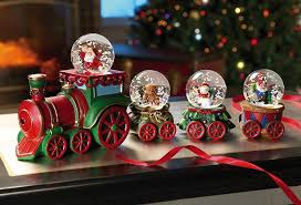 00:43 musical train snow globe with santa and his sleigh, plays several songs. Santa S Collectible Christmas Miniature Snow Globe Train Snow Globes Christmas Snow Globes Christmas Train