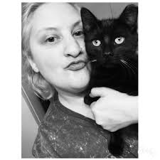 Adopting a playful black tiger cat