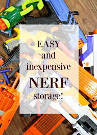 Get those builky plastic guns off the floor with the easy diy nerf gun storage idea! Easy Diy Nerf Gun Storage From Thrifty Decor Chick