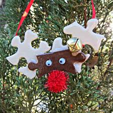 Diy network shows you how to turn old costume jewelry into holiday decorations. Reindeer Puzzle Piece Ornament Morena S Corner