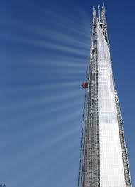 Shard Of Light London S 1 000ft Tower Becomes A Dazzling Beacon As Rays Of Sunshine Reflect Off Its Glass Surface The Shard London Renzo Piano The Shard