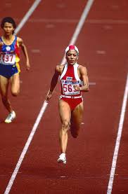 These people, they must be doing something that isn't normal to gain all these muscles. Florence Griffith Joyner Competing At The 1988 Olympic Summer Games Photograph By Pcn Photography