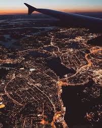 Sky High A Breathtaking View Of The City Lights From The Window Of The Plane For More Travel Airplane Photography Travel Photography Adventure Is Out There
