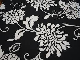 Adding new upholstery fabric can make the couch or seat look as good as new. Black And White Floral Print Upholstery Fabric 13 Dollars One Yard Piece Floral Print Upholstery Upholstery Fabric Fabric Decor