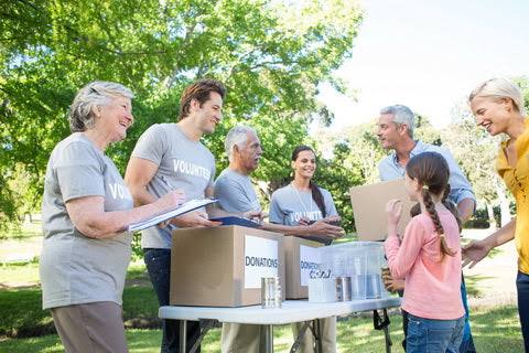 Volunteers giving support in community event