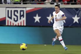 Women's national team members took a knee during the national anthem. Carli Lloyd Makes Best Of 2020 By Reuniting With Her Family Los Angeles Times
