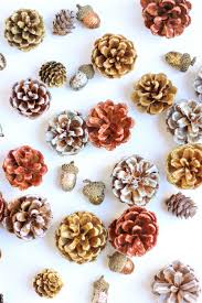 Our home often feels like a hotel, filled with family and friends. Diy Metallic Pinecone And Acorn Wreath Design Improvised