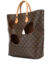 Louis vuitton double zip pochette chain pouch/mini bag in gaint monogram leather m80787 black $250.00 louis vuitton men's trainer calfskin sneakers black/yellow Louis Vuitton Pre Owned X Comme Des Garcons Burned Holes Monogram Tote Farfetch