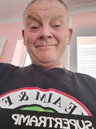 Adahy's mug shot in a proud pose