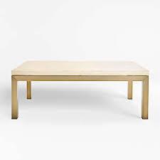 The tabletop is made from solid pine wood and has a butcher block style with visible wood grain and knots for a rustic, antique look. Brass Coffee Tables Crate And Barrel