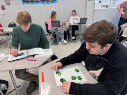 Students in our AP U.S. Government and Politics class have been learning  about gerrymandering and demonstrated how it works using M&Ms. In case you  aren't familiar, gerrymandering is defined as the practice