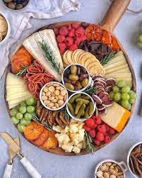 Ain T Too Proud To Meg Food Stylist Sharing Tips To Make Beautiful Boards For Every Occasio Trader Joes Cheese Boards Charcuterie Recipes Trader Joe S Cheese