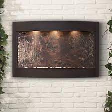 It features a large square backplate, with three large spouts, which frames an elevated rectangular basin. Calming Waters 53 1 2 Wide Modern Stone Wall Fountain 6v062 Lamps Plus