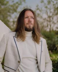 I asked AI to make me look like I work in an office. This is what it came  up with. And I must say….NAILED IT! So just be