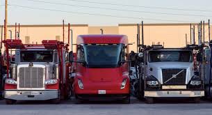 The red tesla semi truck spotted in california, transporting tesla cars for the end of quarter push. Tesla Semi S Spacious Cabin Highlighted In Side By Side Picture With Diesel Trucks