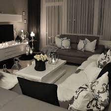One of the hottest trends in interior design right now, is using two ends of the spectrum such as black and white. A Romantic Living Room With Sober And Neutral Colors Be Stunned With These Interior Design Decor And Tips Www Delight Home Living Room Grey Apartment Living