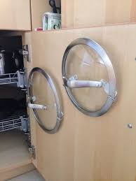 Use 3m Command Strips To Hold Up Pot Lids No More Clanging Kitchen Organization Kitchen Cabinet Organization Diy Cabinets