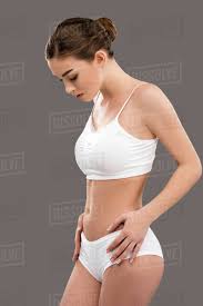Women in briefs by mysterywizz. Beautiful Young Woman Posing In White Underwear Isolated On Grey Stock Photo Dissolve