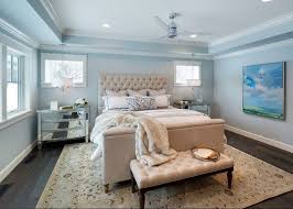 Complete the look painting trim, ceiling and doors to make it easy, use the same white paint color on trim, ceiling and interior doors. Luxurious Cottage Interiors Master Bedroom Paint Color Benjamin Moore Pale Smoke Cottage Interiors Interior Design Home Interior Design
