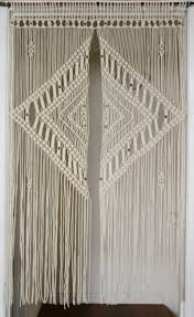 Why not jump on the knotting trend and give this diy project a go? Macrame Door Curtain With Beads