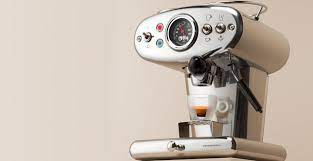 There's a shiny black espresso machine prominently displayed in shannon yee's office in georgia tech's george w. Espresso Machines Italian Coffee Makers Illy Shop