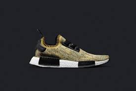 Adidas Nmd R1 Black And Gold Adidas Originals Unveils Gold Nmd R1 Primeknit Sneakers Knit Shoes Adidas