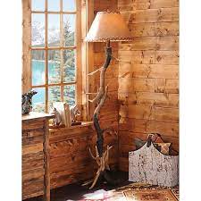 Visit our cabin floor lamps website; Antler Floor Lamp With Faux Leather Shade Kirklands