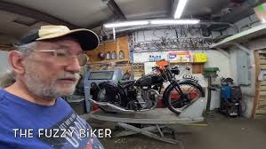 Engineer displays new Wooler motorcycle (1947)