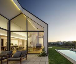 From the road you can see the house, on a small hill, with a dark silhouette in sharp contrast to its natural environment. Gallery Of House In Santo Tirso Hous3 27