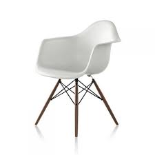 Charles and ray eames created a whole range of dining chairs that can withstand the toughest of environments, the kitchen, and still look effortlessly stylish at the other end. Eames Daw Molded Plastic Armchair With Wood Dowel Base Design Quest Grand Rapids Mi