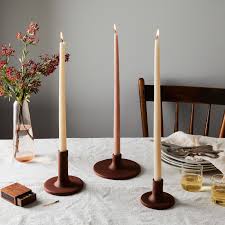 Ceramic Taper Candle Holders On Food52 Although the color of the product(s) you order will be close to the colors pictured, please note that each batch of glazing and kiln firing produces slightly varying hues and colors.