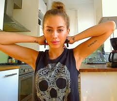 Simple black circle tattoo on the arm. 32 Best Bicep Tattoos Collection