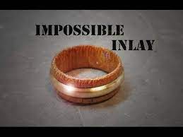 Woodworkers can create wonderful wooden inlays for projects such as fine furniture, custom picture frames, or personalized 1.) place the laminated strip along the tilting bandsaw miter sled fence and make a 45 degree cut at one end. Wooden Ring With Brass Inlay X2f Puinen Sormus Messinkiupotuksella Youtube Wooden Rings Wood Rings Wooden Rings Engagement