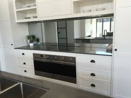 White Kitchen Smoke Grey Mirror Splashback By Verity Rhodes Interiors Mirror Splashback White Kitchen Cabinets Diy White Kitchen Tiles
