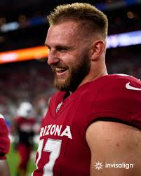 the faces of some happy guys ready to play football next week
