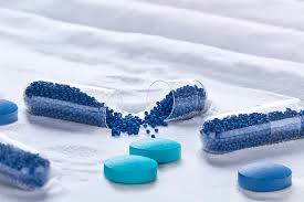 Cross-sectional illustration of a pharmaceutical tablet showing excipients