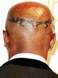 Apart from being highly fashionable, a hairstyle such as the shaved one can actually help you if you happen to have thin hair or even a receding hairline, since it can mask it really well. Jamie Foxx S Head Tattoo Its Meaning Body Art Guru