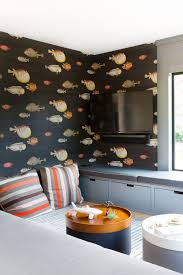 Wallpaper made from vintage magazines gives this entrance hall a truly unique look. Timeless Living Room Wallpaper Ideas That Stand The Test Of Time