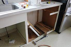 Demonstration of cutting a cabinet opening with an oscillating saw in order to install a dishwasher. Adding A Dishwasher To Existing Cabinets