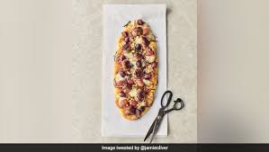 Buying your favourite fresh fruit and veg is all it takes to help feed a child this summer. Celebrity Chef Jamie Oliver Invents Bizarre Grapes Pizza Twitter Is Divided Ndtv Food