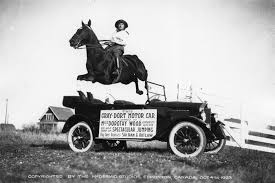 1920s Technology Miss Dorothy Wood And Her Horse Jumping Over A Gray Dort Car Car Bumper Stickers Car Pictures Car