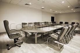 While there are general requirements to observe in office furniture, it is important to narrow down to specifics when it when you are selecting chairs for meeting rooms, it is important to ensure that they are ergonomically stable to support the body of the user in various. Large Table And Chairs In A Modern Stock Image Colourbox