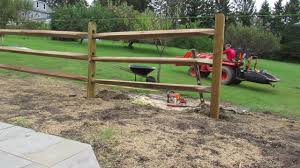 The split rail, or post and rail, fence is essentially a rustic version of a post and board fence style and is similarly a good choice for a decorative accent, for delineating areas, or for marking boundaries without creating a solid visual barrier. How To Install A 3 Split Rail Fence Youtube