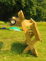 My Father In Laws Great Idea Add Wheels To One Side Of The Picnic Table For Easy Peasy Moving Picnic Table Outdoor Improvements Outdoor Projects