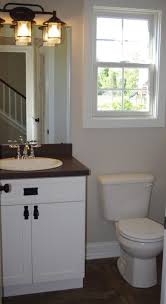 Find ideas and inspiration for dark floor and white walls bathroom to add to your own home. Bathroom Paint Colors For Small Bathrooms With Light Beige Color And Dark Wood Floors