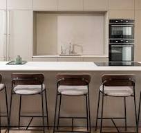 Elegant kitchen island with Boost Stone Ivory stone effect